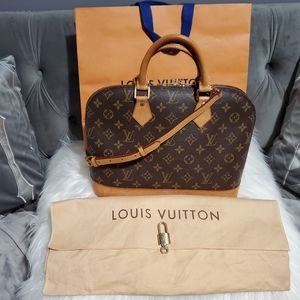 100% Authentic Louis Vuitton Alma Monogram w Strap, Dust Cover, Lock with Key